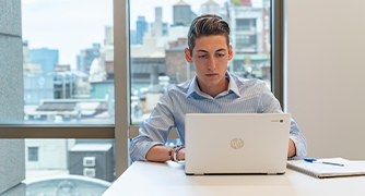 Image of student on laptop.